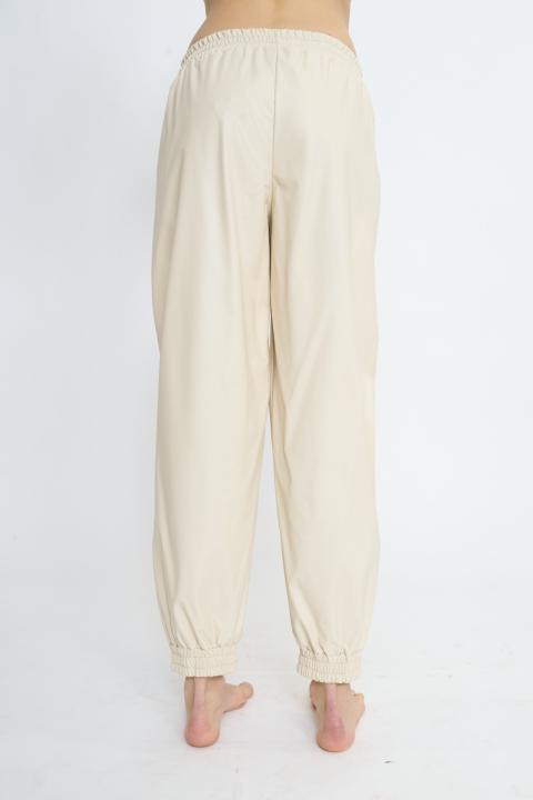 Jogger effetto pelle coulisse beige - Primavera Estate 2026 | Brend